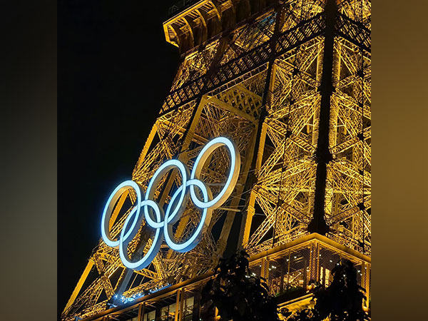 Eiffel Tower  illuminated in Olympic tones Ahead of Paris 2024 opening ceremony